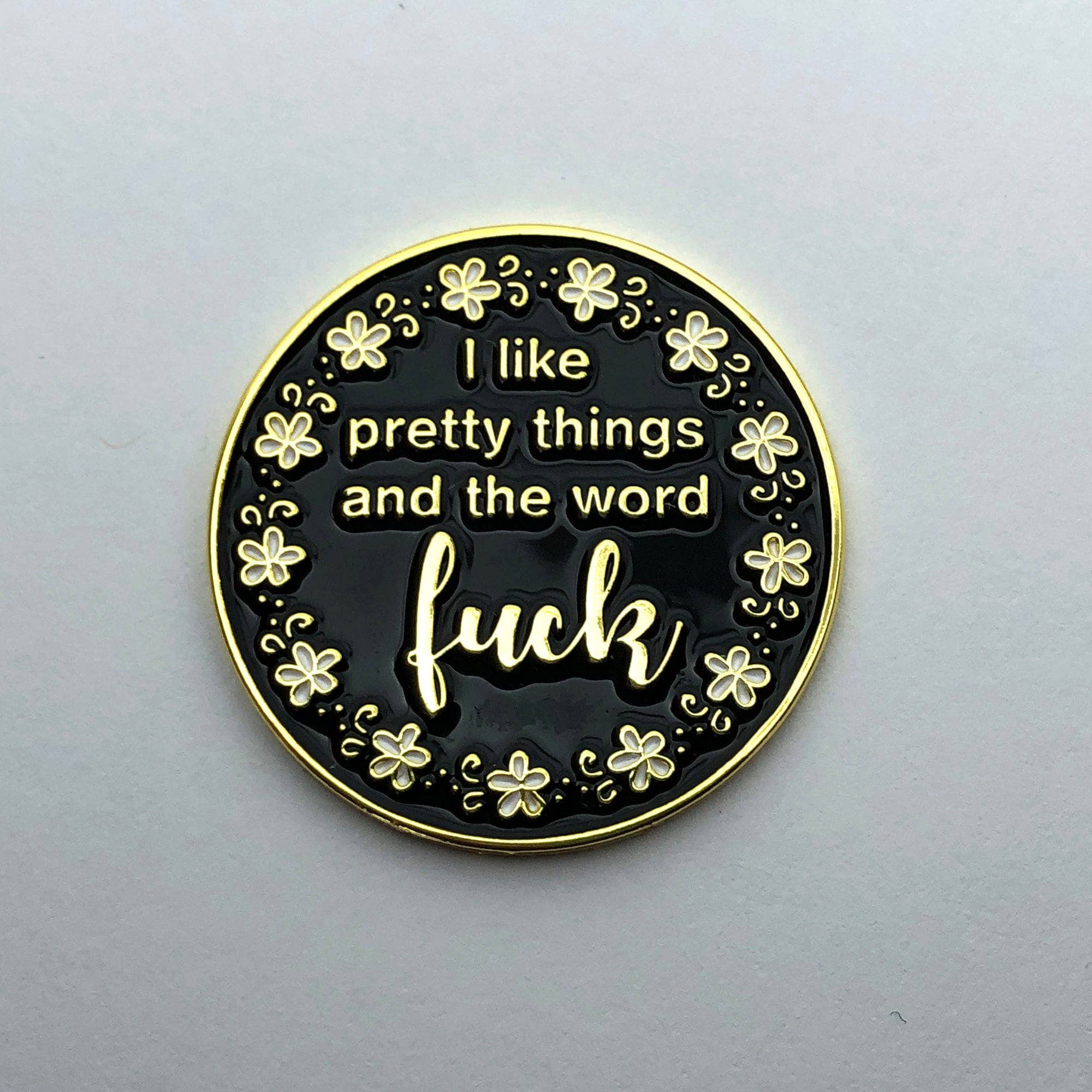 I like pretty things and the word F-ck Needle Minder